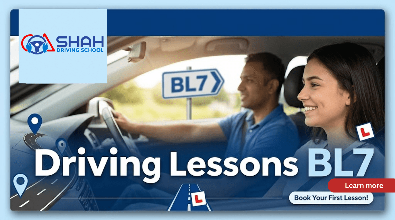 A professional website blog banner for 'Shah Driving School' with a background photo of a female student smiling while driving a car under the guidance of a male instructor. The text 'Driving Lessons BL7' is prominently displayed in the foreground, with the 'BL7' road sign visible in the background against a backdrop of green fields and trees. The banner features blue and white colors and includes a 'Book Your First Lesson!' button.