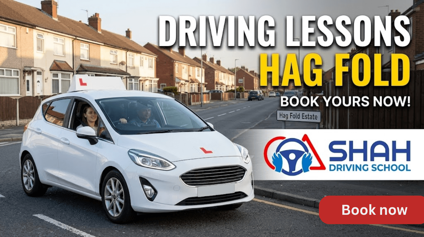 A photo showing a learner driving car on a residential street. The car is white, has 'L' plates on the roof and bonnet. Two people are in the car: a female student driver in the driver's seat and a male instructor in the passenger seat. The street is lined with houses. In the background there is a sign that reads 'HAG FOLD ESTATE'. Text on the image reads: "DRIVING LESSONS HAG FOLD. BOOK YOURS NOW!". There is also a 'Shah Driving School' logo on the image and text that reads: "Local & Reliable".