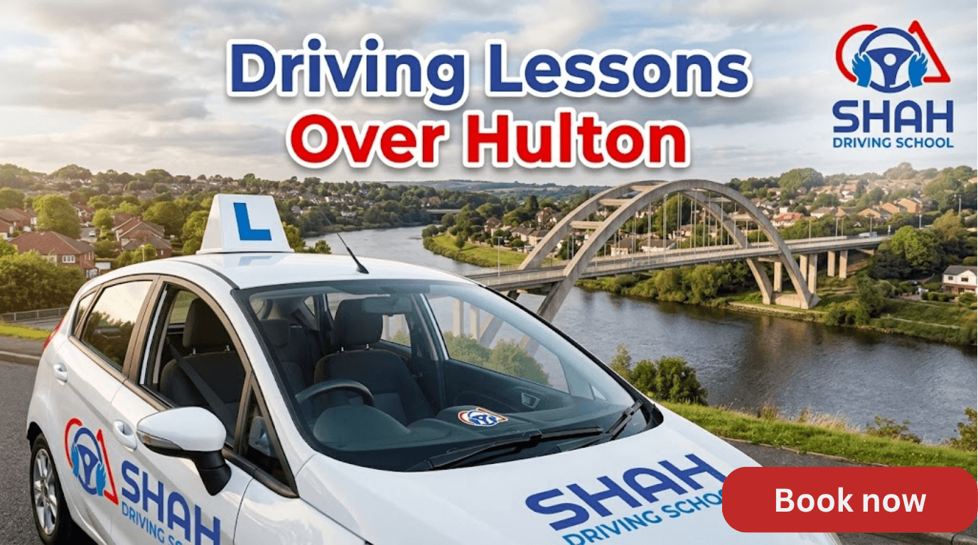 "A promotional banner featuring a white 'SHAH DRIVING SCHOOL' learner car with an 'L' roof sign parked on a hill overlooking a large river bridge and a town. The banner includes the blue and red title text 'Driving Lessons Over Hulton' at the top and the 'SHAH DRIVING SCHOOL' logo with a steering wheel graphic in the top-right corner and on the car door."