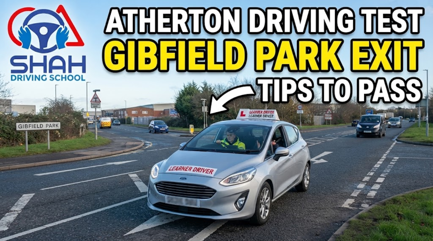 thumbnail for "Shah Driving School," featuring a silver Ford Fiesta learner car exiting the Gibfield Park industrial estate onto Atherton Road. The scene includes a "Gibfield Park" sign, road markings, and other vehicles. Large yellow and white text overlays read "ATHERTON DRIVING TEST" and "GIBFIELD PARK EXIT TIPS TO PASS". A white arrow points directly to the car.